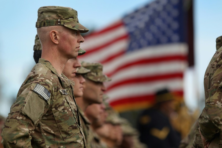 Soldiers bound for Afghanistan stand at parade rest during a departure ceremony on November 4, 2011 in Fort Carson, Colorado. ©AFP