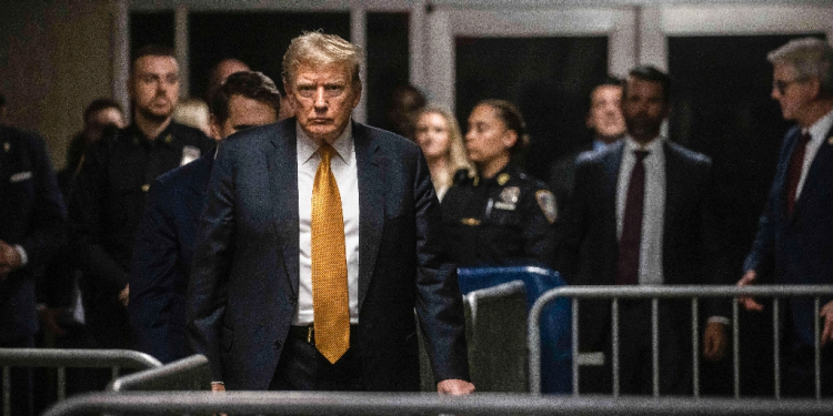 Former US president Donald Trump arrives to speak to the media at the end of the day's proceedings in his criminal trial at Manhattan Criminal Court / ©AFP