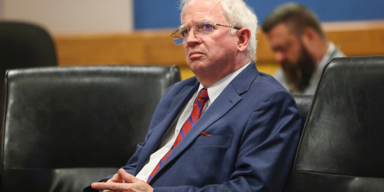 John Eastman, seen here in a Georgia courtroom, denies Arizona charges that he tried to subvert the 2020 presidential election / ©AFP