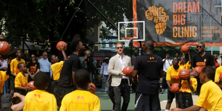 Britain's Prince Harry (C), Duke of Sussex, took part in a Lagos basketball exhibition on his visit to Nigeria to promote the Invictus Games. ©AFP