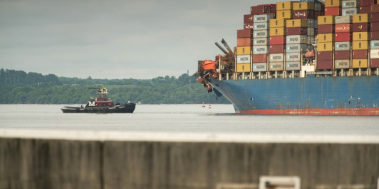 Tugboats guide the container ship Dali after it was refloated in Baltimore, Maryland. ©AFP