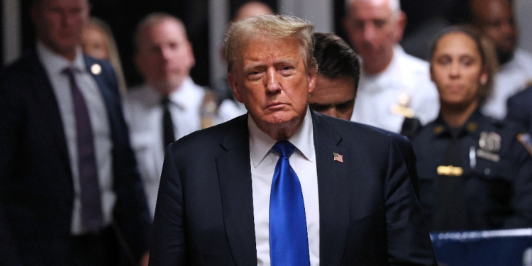 Donald Trump exits the courtroom after he was convicted in his criminal trial at Manhattan Criminal Court in New York / ©AFP