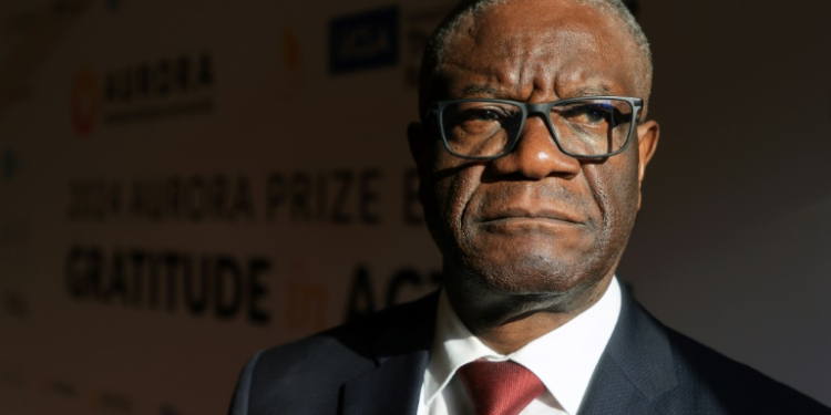 Congolese gynecologist Denis Mukwege poses for a portrait at the UCLA Luskin Conference Center in Los Angeles, California on May 9, 2024, where he was awarded the 2024 "Aurora Prize for Awakening Humanity. ©AFP