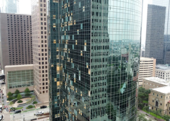 Shattered windows are seen on buildings in downtown Houston on May 17, 2024, one day after the city was hit by severe storms. ©AFP