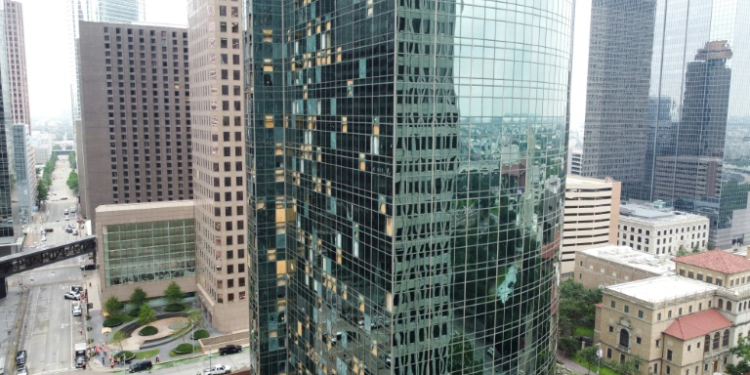 Shattered windows are seen on buildings in downtown Houston on May 17, 2024, one day after the city was hit by severe storms. ©AFP