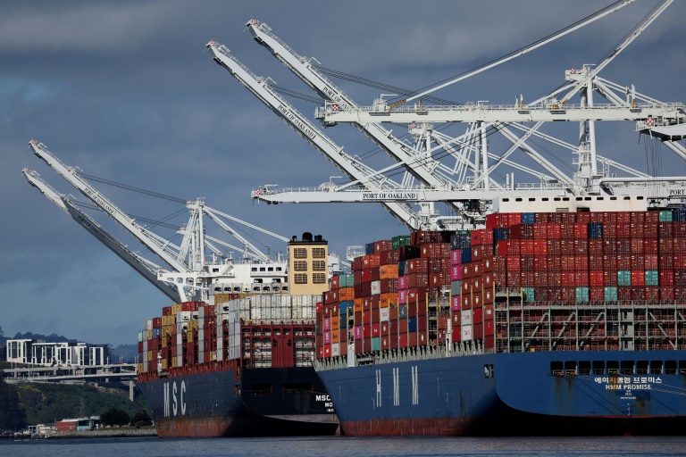 The US trade deficit narrows slightly to $69.4 billion in March, but the gap remains wider than analysts anticipated. ©AFP