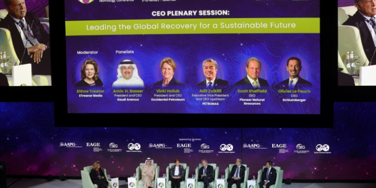 Scott Sheffield, shown here on a February 2022 panel with the CEO of Saudi Aramco, will be barred from the ExxonMobil board under a proposed consent order by the Federal Trade Commission. ©AFP