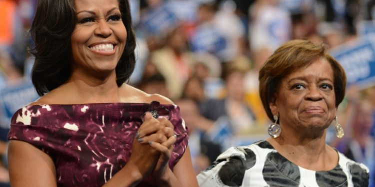 Then First Lady Michelle Obama (L) and her mother Marian Robinson are seen in Charlotte, North Carolina in September 2012. ©AFP