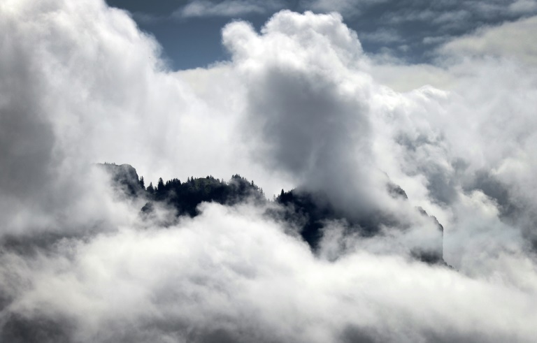 Cloud can both protect Earth from the Sun's radiation or trap it in like a blanket, scientists say. ©AFP