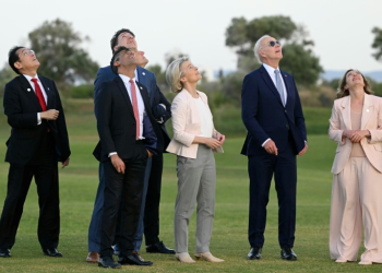 G7 leaders attend a skydiving demonstration at the San Domenico Golf Course in Savelletri, Italy . ©AFP