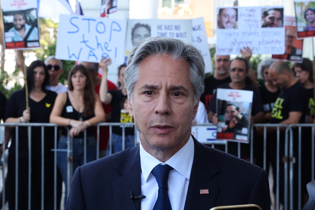 US Secretary of State Antony Blinken talks to reporters in Tel Aviv after a meeting with families and supporters of Israelis held hostage in Gaza / ©AFP