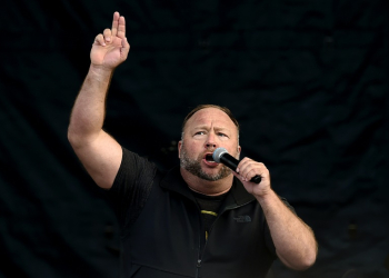 US far-right radio show Alex Jones speaks to supporters of US President Donald Trump as they demonstrate in Washington, DC, in December 2020. ©AFP