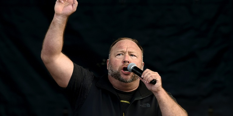 US far-right radio show Alex Jones speaks to supporters of US President Donald Trump as they demonstrate in Washington, DC, in December 2020. ©AFP