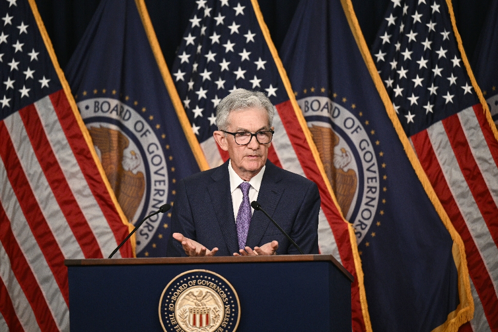 Jerome Powell said the Fed was prepared to keep interest rates where they are 'as long as appropriate' if inflation persists and growth remains strong / ©AFP