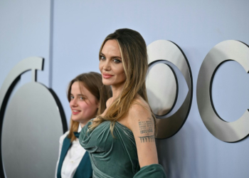 US actress Angelina Jolie (R), seen with daughter Shiloh, is one of the producers of 'The Outsiders,' which won the Tony Award for best musical. ©AFP