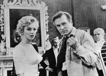 Marilyn Monroe, seen here with British actor and director Laurence Olivier, was one of the most famous figures of the 20th century. ©AFP