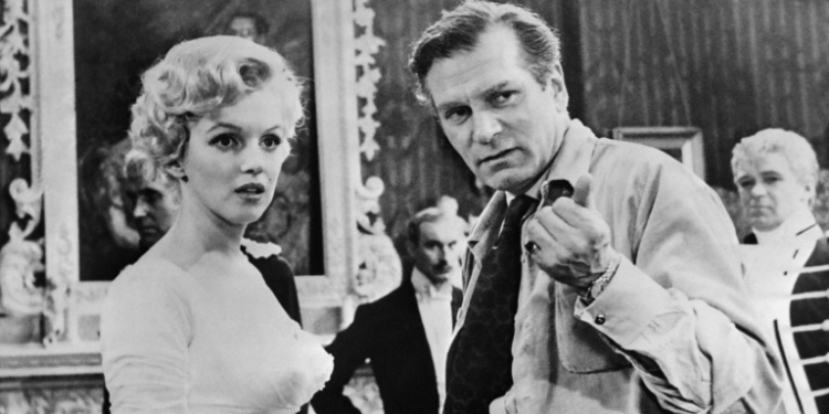 Marilyn Monroe, seen here with British actor and director Laurence Olivier, was one of the most famous figures of the 20th century. ©AFP