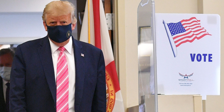 Former US president Donald Trump leaves a polling station after casting his ballot in the November 2020 presidential election / ©AFP