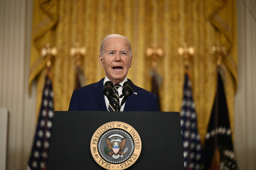 US President Joe Biden has ordered sweeping new migrant curbs to 'gain control' of the US-Mexico border / ©AFP