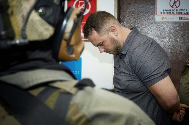 John Nelson Poulos was arrested in January 2023 in Panama while on the run from Colombian authorities for the murder of 23-year-old Valentina Trespalacios. ©AFP