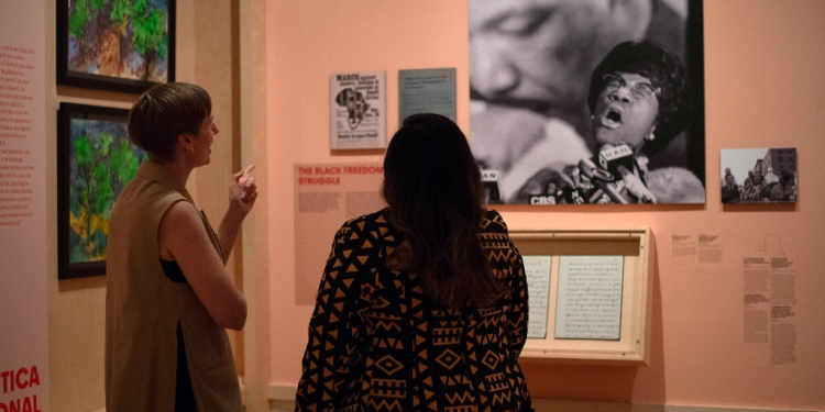 Sarah Seidman (L) and Zinga Fraser are co-curators of the 'Changing the Face of Democracy: Shirley Chisholm at 100' exhibition in New York / ©AFP