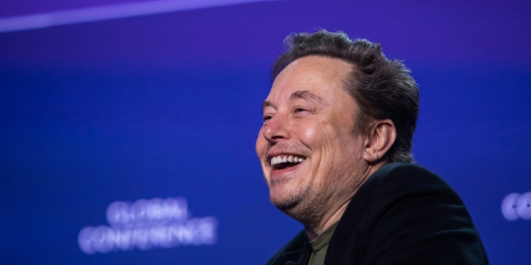 Tesla has urged shareholders to vote in favor of CEO Elon Musk's huge pay plan after a Delaware judge struck it down . ©AFP