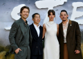 Glen Powell, Daisy Edgar-Jones and Anthony Ramos star in 'Twisters' from director Lee Isaac Chung (2nd from L). ©AFP