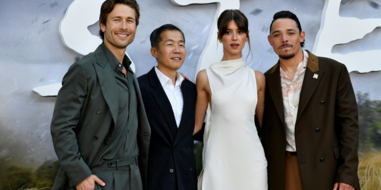 Glen Powell, Daisy Edgar-Jones and Anthony Ramos star in 'Twisters' from director Lee Isaac Chung (2nd from L). ©AFP