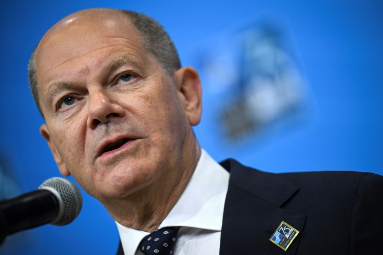 German Chancellor Olaf Scholz speaks to reporters at the NATO 75th anniversary summit in Washington, where he hailed a US decision to temporarily station some long-range missiles in Germany. ©AFP