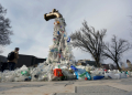 A sculpture titled "Giant Plastic Tap" by Canadian artist Benjamin Von Wong is displayed outside the fourth session of the UN Intergovernmental Negotiating Committee on Plastic Pollution in Ottawa, Canada, on April 23, 2024. ©AFP