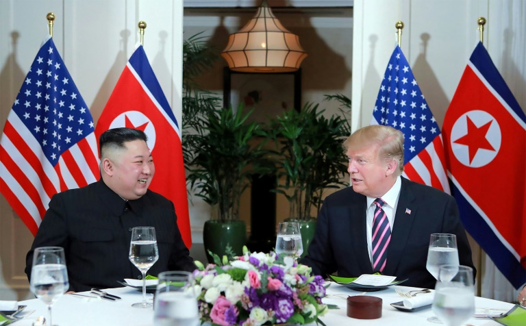 Trump and Kim enjoying dinner.