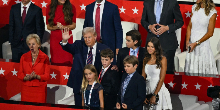 Former US president Donald Trump stands with his grandchildren during the Republican National Convention in Milwaukee, Wisconsin on July 17, 2024 / ©AFP