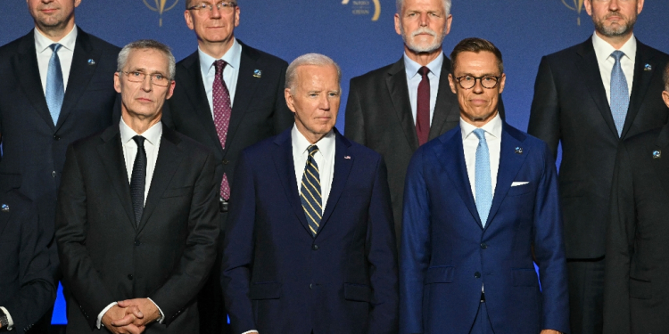 US President Joe Biden faces questions over his political future as he hosts NATO's summit in Washington / ©AFP