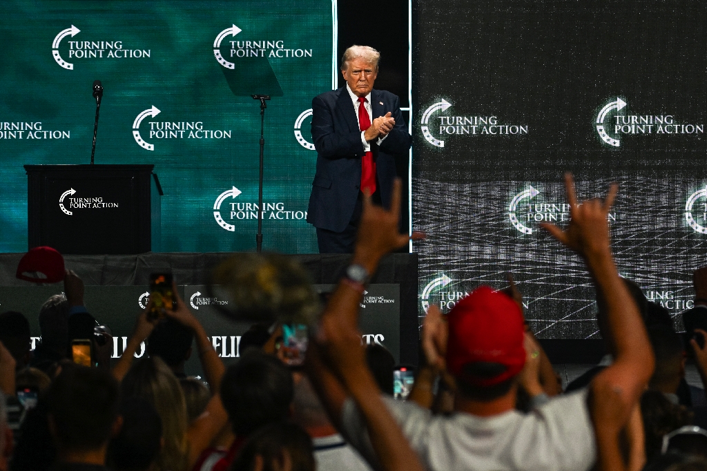 US presidential candidate Donald Trump onstage after speaking at Turning Point Action's 'The Believers Summit' in West Palm Beach, Florida, on July 26, 2024 / ©AFP