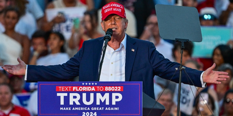 Former US President and Republican presidential candidate Donald Trump gestures as he speaks during a rally in Doral, Florida, on July 9, 2024 / ©AFP