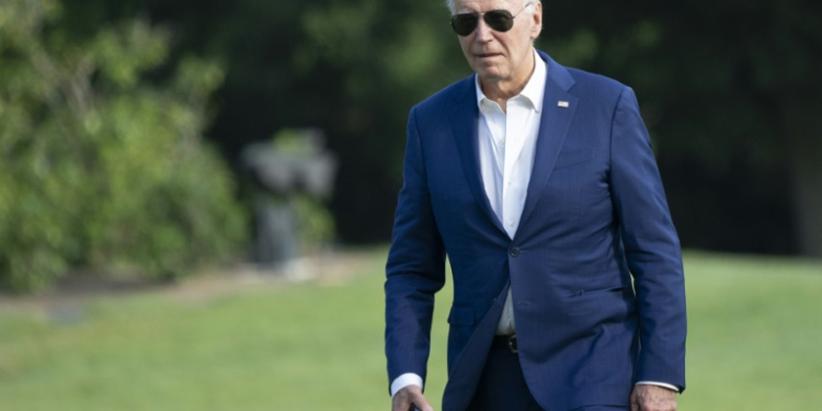 US President Joe Biden walks to the White House in Washington, DC, on July 7, 2024, after attending campaign events in Pennsylvania.. ©AFP