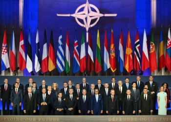 NATO leaders pose for a family photo during the NATO 75th anniversary celebration. ©AFP