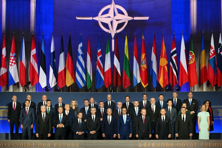 NATO leaders pose for a family photo during the NATO 75th anniversary celebration. ©AFP