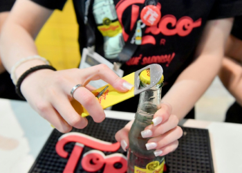 Strong sales of the Topo Chico seltzer brand helped lift Coca-Cola to better than expected profits. ©AFP