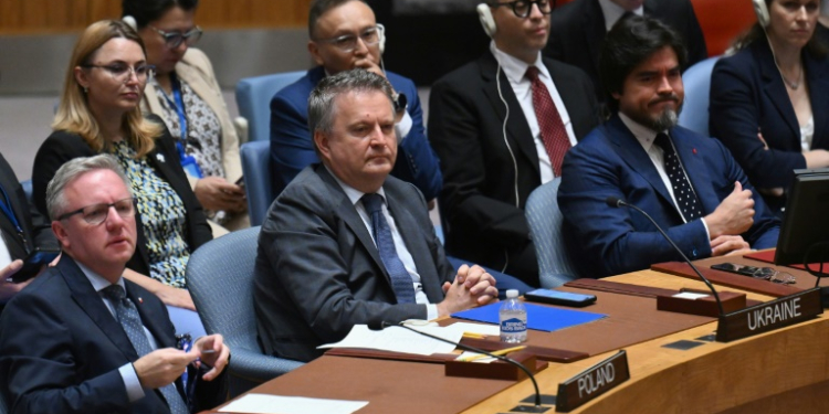 Ukrainian Ambassador to the UN Sergiy Kyslytsya (C) listens during an emergency meeting of the UN Security Council on July 9, 2024. ©AFP