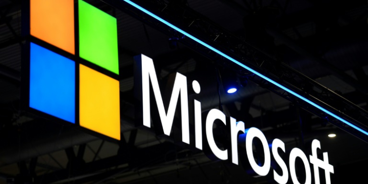 Analysts forecast double-digit growth for companies such as Microsoft, driven by artifical intelligence. ©AFP