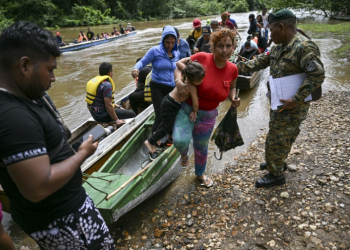 Migrants arrive at a reception center in the Darien region of Panama. ©AFP