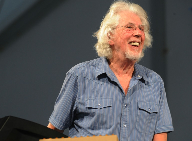 Blues legend John Mayall, who died on July 22, 2024 at age 90, is seen performing at the New Orleans Jazz & Heritage Festival in 2009. ©AFP