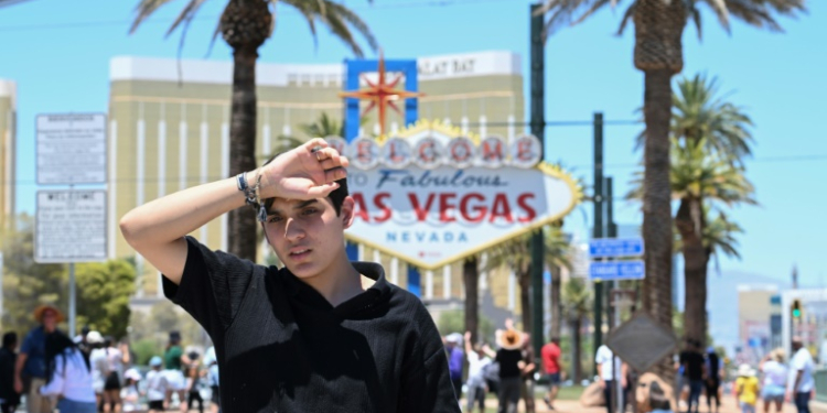 A man walks near the Las Vegas strip during a heatwave in Las Vegas, Nevada, on July 7, 2024. ©AFP