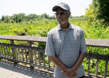 Dennis Chestnut, an advocate for making the Anacostia River swimmable, speaks with AFP from a lily pad garden near the river's banks. ©AFP