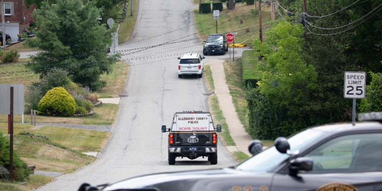 A police bomb squad car was seen driving towards the home of Thomas Matthew Crooks, the suspected shooter of former US president Donald Trump, as the FBI investigates the incident. / ©AFP