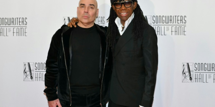 Hipgnosis executive Merck Mercuriadis (L) and co-founder Nile Rodgers attend the Songwriters Hall of Fame 2024 induction and awards gala in New York on June 13, 2024. ©AFP