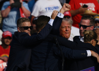 The image of Republican presidential candidate Donald Trump being whisked away by the Secret Service is already iconic / ©AFP