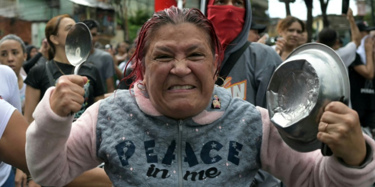 The CNE electoral council, loyal to Maduro, said he had won 51.2 percent of the vote. ©AFP