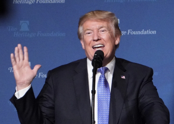 US President Donald Trump, seen giving a speech at a Heritage Foundation event in 2017, has sought to distance himself from its Project 2025 governing agenda / ©AFP